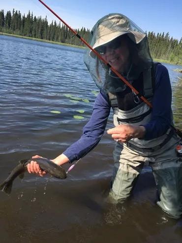 Mim fly fishing in Alaska