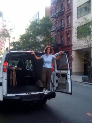Mim with her work van
