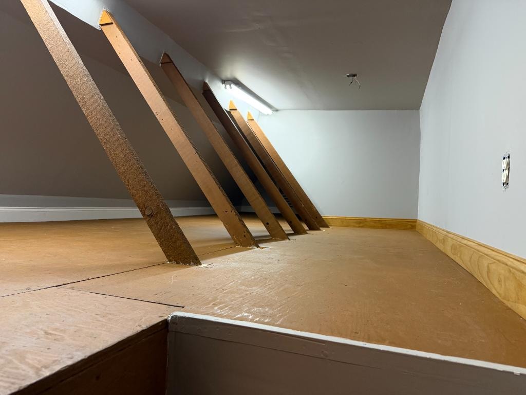 Attic after cleanout — cleared and organized